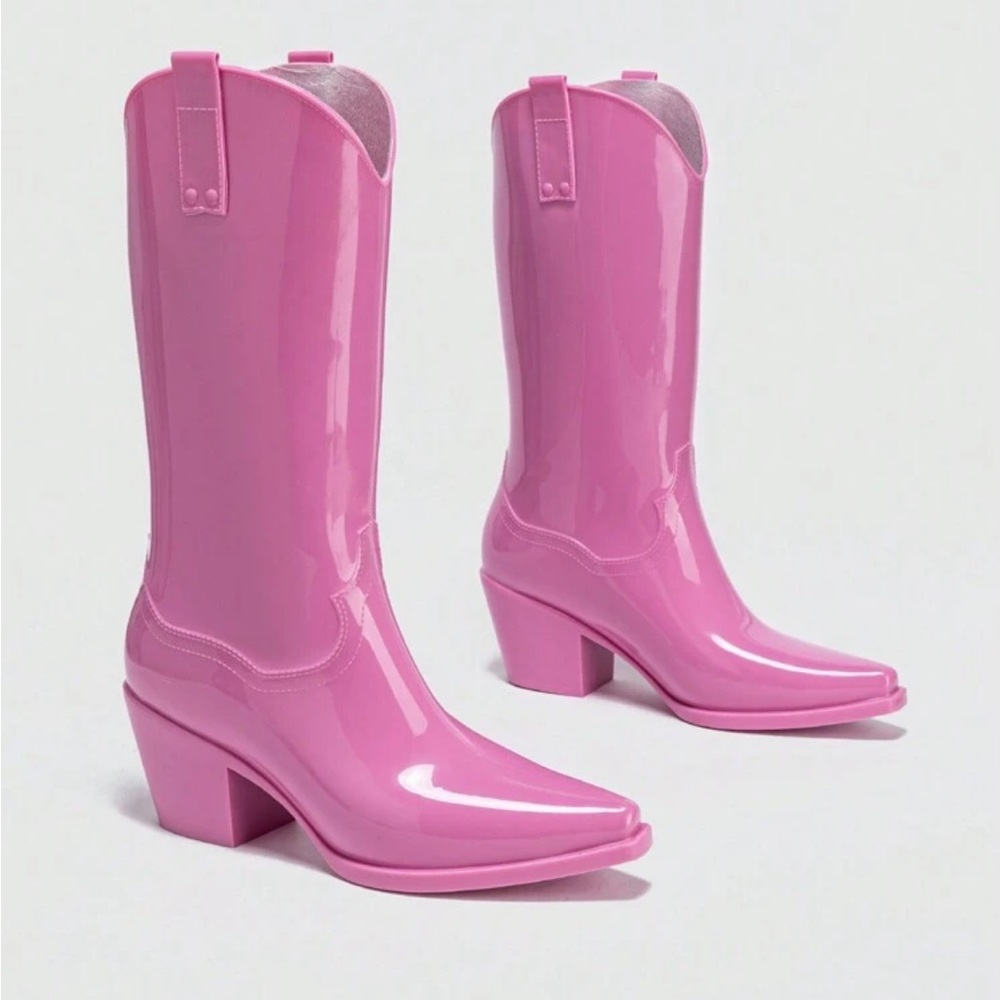 Woman’s long water proof glossy pink rain boots
